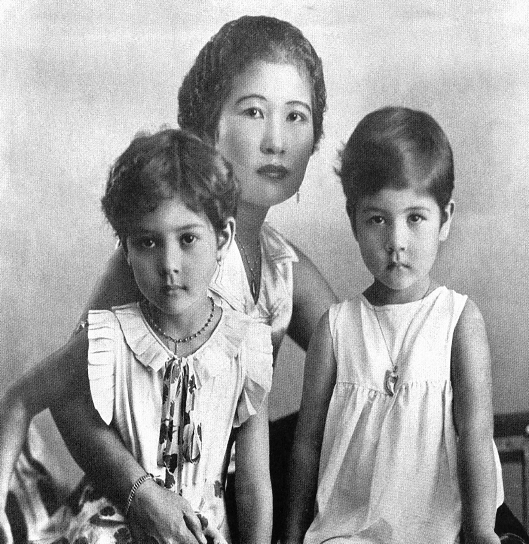 Chalerm and her two daughters